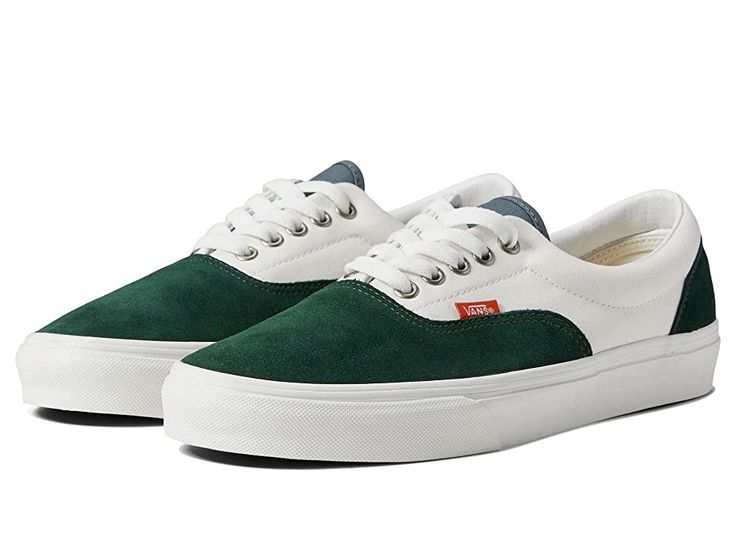 Vans Era - Skate Shoes : Varsity Canvas Green/Blue : The Vans Era skate shoes keep your style going strong with clean and uncomplicated style, with more padding than the classic Authentic. Skateboard shoes with a low-top silhouette. Uppers of canvas, leather, or man-made materials with a double-stitched vamp. Cotton drill lining for breathable wear. Padded collar for added support. Die-cut EVA insert for reliable comfort. Vulcanized sole attachment with iconic waffle outsole for grippy wear and Vans Low-top Skate Shoes With Rubber Toe Cap, Vans Low-top Canvas Shoes With Gum Sole, Trendy Skate Shoes With Perforated Toe Box For Streetwear, Green Vans Skate Shoes With Gum Sole, Low-top Canvas Shoes With Vulcanized Sole For Skateboarding, Vans Low-top Skate Shoes With Perforated Toe Box, Vans Canvas Shoes With Vulcanized Sole For Streetwear, Vans Lace-up Sneakers With Rubber Heel Cap, Casual Skate Shoes With Rubber Toe Cap