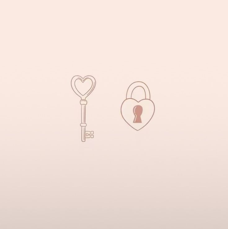 two keys and a heart shaped lock on a pink background