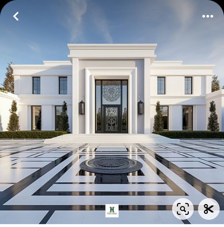 a large white house with a black and white checkerboard pattern on the floor