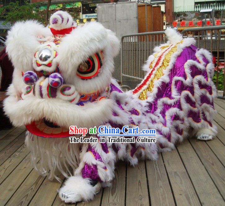 a white and purple dragon costume on display