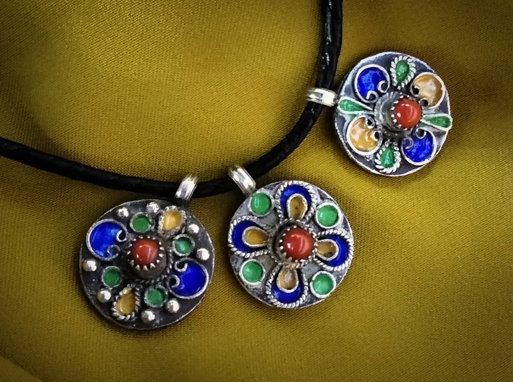 Three ancient Kabyle ethnic pendants to be mounted on necklaces, in solid silver with coral beads. I still have others of the same kind but different on my shop, you can visit it. **Height: 2.5 cm. **Width: 1.9 cm. **Material: sterling silver, real coral. **Total weight: 17.5 grams. **Origin: Region of the Great Kabyle 1980s - Algeria. **Free shipping worldwide by DHL. I am always open to offers for one of my items, so please contact me if you would like to make an offer. Please contact me if yo Traditional Necklace With Natural Stones And Round Pendant, Traditional Necklaces With Natural Stones And Round Pendant, Traditional Round Pendant Necklace With Natural Stones, Traditional Nickel Free Round Pendant Necklace, Traditional Nickel Free Round Beaded Necklaces, Traditional Nickel-free Round Pendant Necklace, Adjustable Nickel-free Traditional Necklace, Traditional Sterling Silver Pendant Beaded Necklace, Traditional Adjustable Nickel-free Necklace