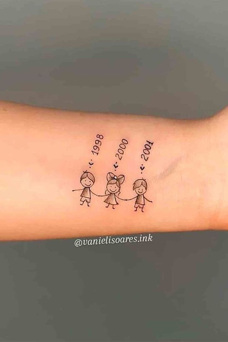 a woman's arm with two small children on it and the words love is written in