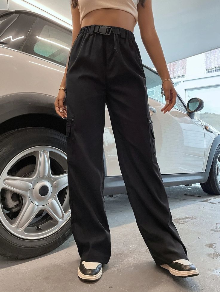 Add a unique and stylish twist to your wardrobe with these Flap Pocket Cargo Pants With Buckle Waist. These pants feature flap pockets that provide a functional and fashionable element to the design. The buckle waist adds an extra touch of detail and versatility. Made from high-quality materials, these cargo pants offer durability and a comfortable fit. Whether you dress them up or down, these flap pocket cargo pants with a buckle waist will make a statement in your outfit. Specifications: Style Utility Pants With Flap Pockets, Chic High Waist Bottoms With Multiple Pockets, Chic Trousers With Multiple Pockets, Trendy Cargo Style Workwear Bottoms, Trendy Cargo Style Bottoms For Workwear, Chic Mid-rise Pants With Cargo Pockets, Chic High-waisted Pants With Multiple Pockets, Solid Straight Leg Cargo Pants With Belt Loops, Solid Color Straight Leg Cargo Pants With Belt Loops