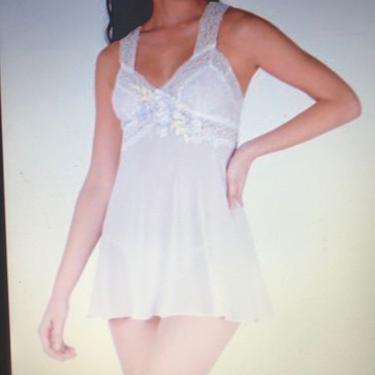 Linea Donatella Sherelle Chiffon Babydoll & G-String Set Color: Lavender Size: L 100% Polyester Length: 30” Matching G-String Included Fitted Sheer White Nightgown, White Sheer Fitted Nightgown, White Sleeveless Sleepwear With Delicate Lace, Sheer Sleeveless Coquette Nightgown, White V-neck Coquette Sleepwear, White Coquette V-neck Sleepwear, Fitted Feminine White Nightgown, Delicate White Sleeveless Camisole, White Fitted Feminine Nightgown