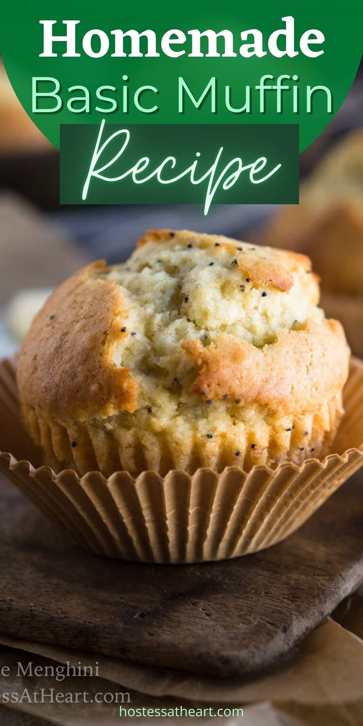 a muffin on top of a wooden cutting board with the words homemade basic muffin recipe