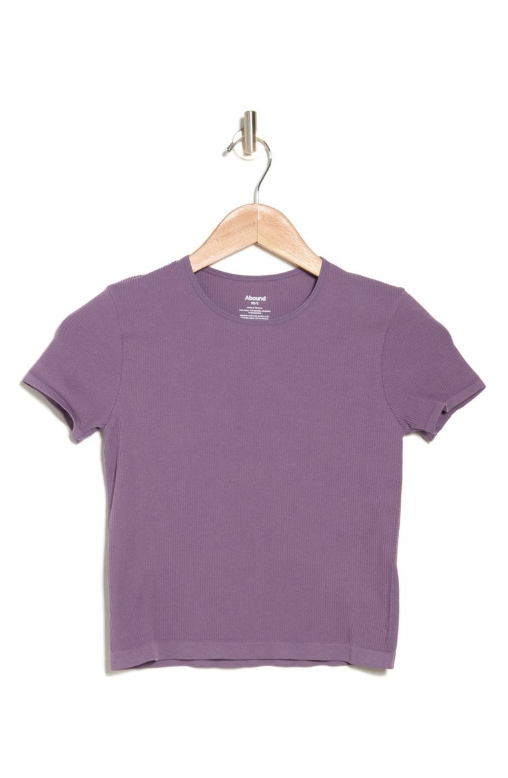 An essential for endless outfits, this baby tee is made from stretchy ribbed fabric that creates a figure-hugging fit. Crewneck Short sleeves 93% nylon, 7% spandex Machine wash, line dry Imported Basic Seamless Snug Fit T-shirt, Fitted Basic Ribbed T-shirt, Everyday Ribbed T-shirt, Basic Solid Stretch T-shirt, Solid Color Ribbed Short Sleeve Stretch Top, Solid Ribbed Stretch Short Sleeve Top, Solid Stretch Ribbed Short Sleeve Top, Stretch Ribbed Solid Short Sleeve Top, Stretch Crew Neck Cropped T-shirt