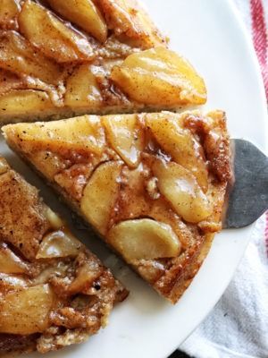 a white plate topped with slices of apple pie