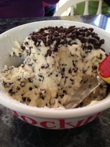 a bowl filled with ice cream and chocolate chips