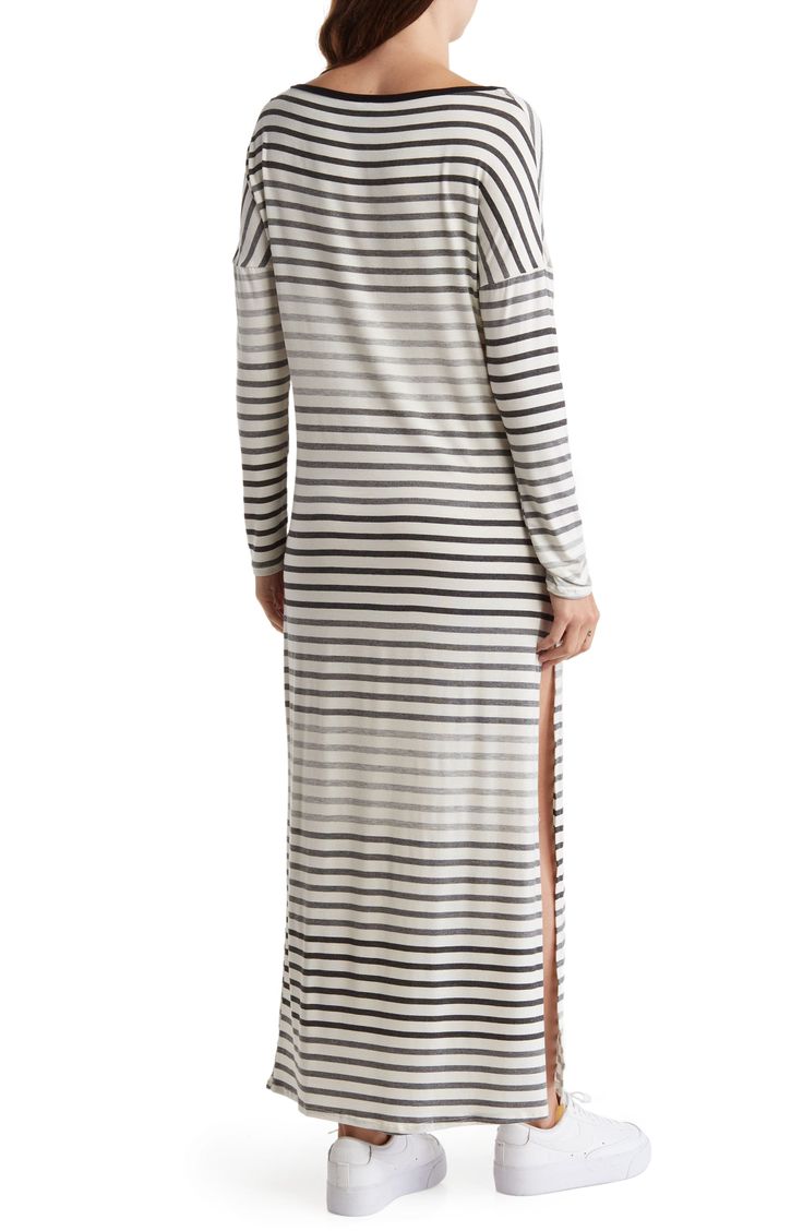 Keep it cute and casual in this T-shirt maxi dress that is covered in a striped print and framed by long sleeves. Boat neck Long sleeves 90% modal, 10% spandex Hand wash cold, lay flat to dry Made in the USA Model stats: 5'10", 32" bust, 25" waist, 36" hip. Model is wearing size Small. Striped Long Sleeve Maxi Dress For Summer, Spring Striped Long Sleeve Maxi Dress, Long Sleeve Striped Maxi Dress For Summer, Striped Casual Maxi Dress For Day Out, Casual Striped Maxi Dress For Day Out, Striped Maxi Dress For A Casual Day Out, Spring Striped Loungewear Dress, Spring Long Sleeve Dress With Striped Sleeves, Spring Dress With Striped Long Sleeves