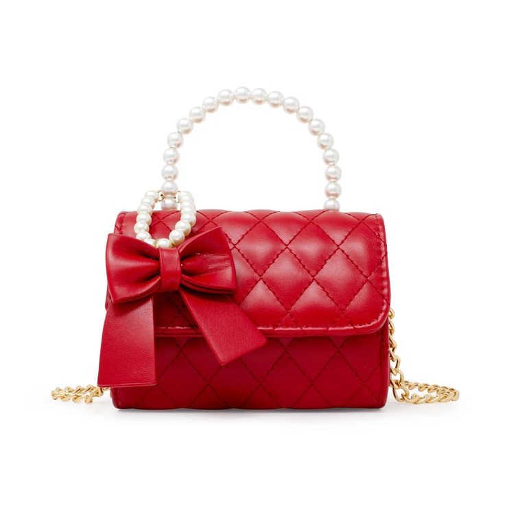 Upgrade your child's accessory game with the Elegant Quilted Leatherette Kids Handbag. Designed to impress, this handbag boasts a chic quilted leatherette exterior that exudes sophistication and style. Perfect for any occasion, it’s a versatile accessory that complements any outfit, from casual to dressy. A standout feature of this handbag is the matching removable bow, adorned with delicate pearls, which attaches gracefully to the handle. This charming detail adds a touch of elegance and can be removed to suit your child’s preference. The bag also includes a gold-tone chain strap, offering the versatility to wear it as a shoulder bag or crossbody, ensuring comfort and style. The handbag is equipped with a magnetic flap closure, providing easy access while keeping contents secure. Whether Bow Handbag, Chic Quilts, Pearl Bow, Matching Mom, Bow Ribbon, Girls Quilts, Gift Accessories, Accessories Shop, Chain Strap