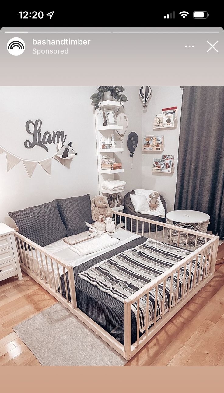 a room with a bed, couch and shelves on the wall