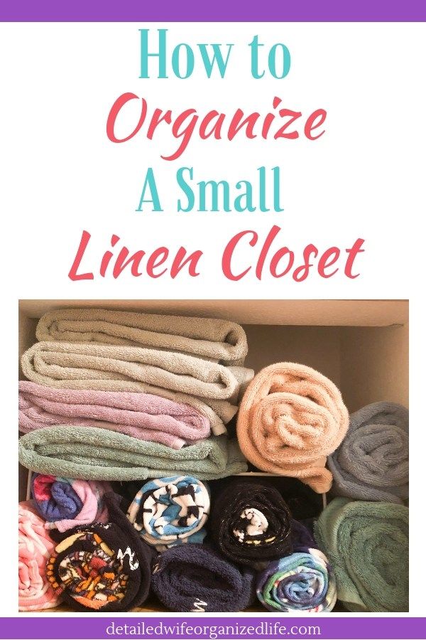 an open box filled with folded towels and the title how to organize a small linen closet