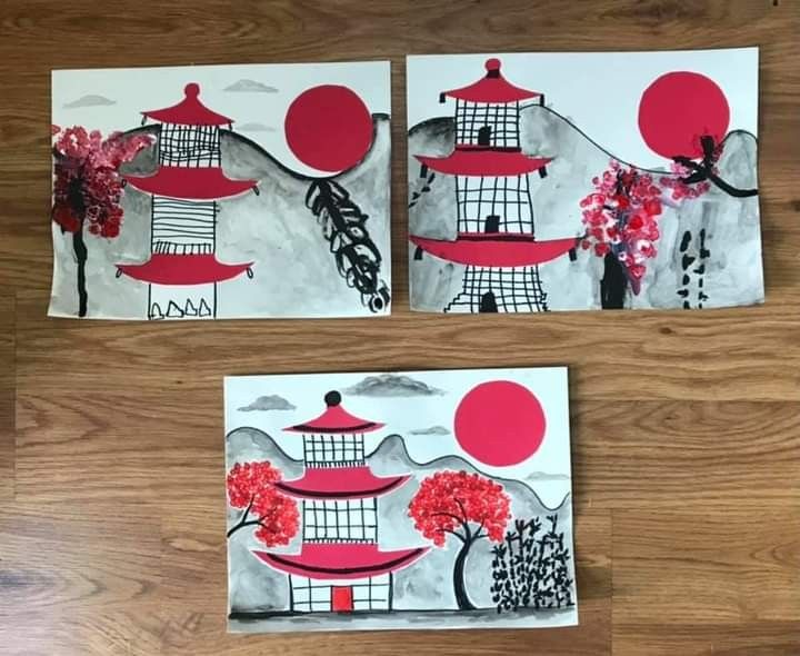 three pieces of paper with red and white designs on them