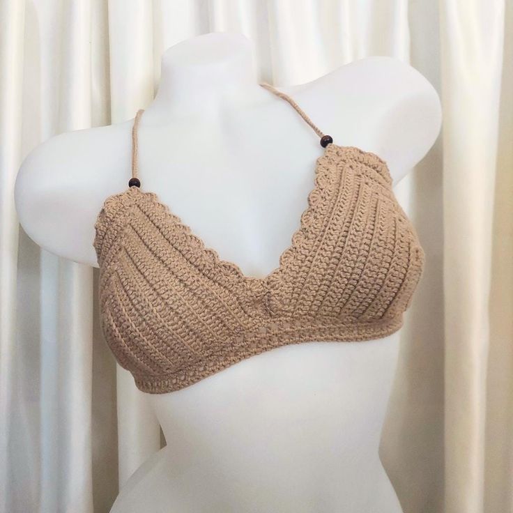 Handmade Crochet Bikini Top for Women Beachwear Dive into summer with our stunning handmade crochet bikini top, a perfect addition to your beachwear collection. Crafted with care and attention to detail, this bikini top combines comfort, style, and functionality for the ultimate beach experience. **Features Color: Elegant brown Size: Adjustable back and neck straps ensure a perfect fit for any body shape. Material: Made with high-quality, %100 cotton, durable yarn for long-lasting wear. Customizable: Tailored to your cup size for a personalized fit. **Why You'll Love It Handmade Quality: Each piece is meticulously handcrafted, ensuring unique and high-quality workmanship. Comfortable & Stylish: Soft yarn and a flattering design provide both comfort and chic style. Versatile: Perfect for th Beachwear Collection, Beachwear For Women, Top For Women, Soft Yarn, Sarong, Comfort Style, Style Chic, Body Shape, Handmade Crochet