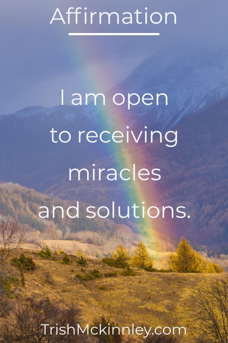 a rainbow and mountains with the words affirmation i am open to receiving pinnacles and