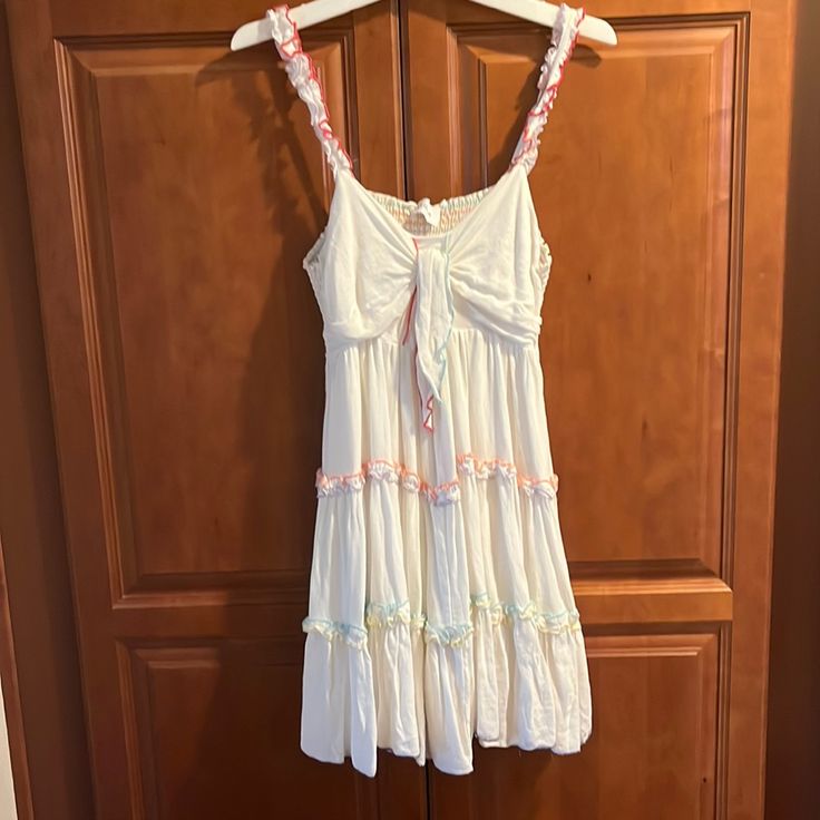 Cute White Dress! Never Worn Cute Sleeveless Mini Dress For Spring, Cute Mini Sleeveless Dress For Spring, Cream Sundress Mini Length, Cream Knee-length Sundress, Cream Mini Sundress, Daytime Cotton Lined Dresses, Cotton Daytime Dresses With Lining, Cotton Daytime Dress With Lining, Cute Sleeveless Cream Mini Dress