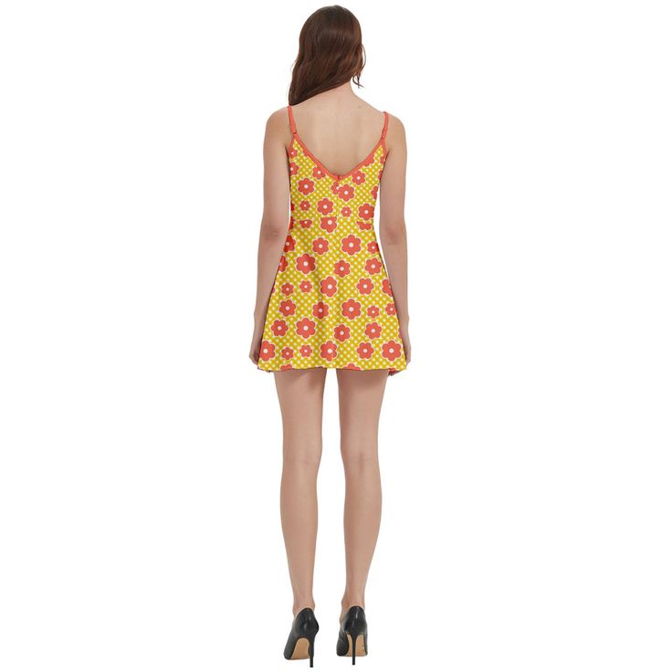 Yellow Orange Floral Dress: Eye-catching retro-inspired piece featuring a vibrant mod floral pattern in sunny yellow and bold orange hues Spaghetti Strap Mini Dress: Delicate straps offer a feminine touch, perfect for showcasing sun-kissed shoulders and embracing the 60s mod aesthetic Mod Floral Dress: Fun and lively 60s-inspired floral print captures the essence of mod fashion, making a playful statement wherever you go Retro Inspired Dress: Channels the spirit of 1960s fashion with a contempor Retro Printed Mini Dress For Summer, Retro Fitted Sleeveless Sundress, Retro Fitted Floral Print Sundress, Fitted Retro Floral Print Sundress, Fitted Retro Floral Sundress, Retro A-line Sundress For Summer, Yellow Dresses With Retro Print For Summer, Yellow Retro Print Summer Dress, Fitted Retro Print Mini Dress For Summer