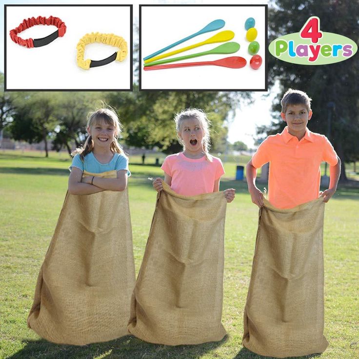 three children are standing in the grass with their hands on their hipss