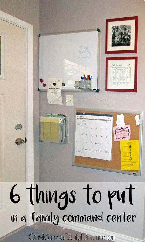 a bulletin board is hanging on the wall next to a door