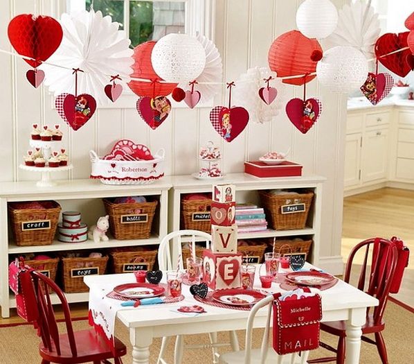 valentine's day table setting with red and white decorations