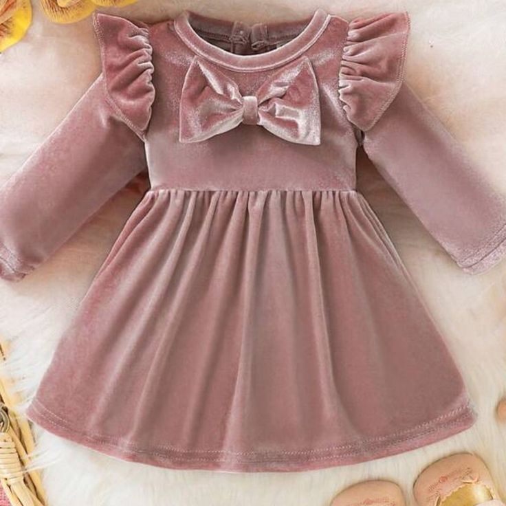 This Dress Is Beautiful! Brand New/Nwt Dusty Rose Pink Color Bow On Front Keyhole Back Ruffle Shoulder Trim 95% Polyester 5% Elastane Size 1-3 Months Feel Free To Make A Reasonable Offer Most Offers Accepted Winter Pink Ruffled Dresses, Pink Long Sleeve Dress For Playtime, Pink Dress For Dress-up Occasions In Fall, Cute Pink Winter Dress, High Neck Black Dress, Purple Ruffle Dress, Camouflage Dress, Rose Pink Color, Dresses Velvet