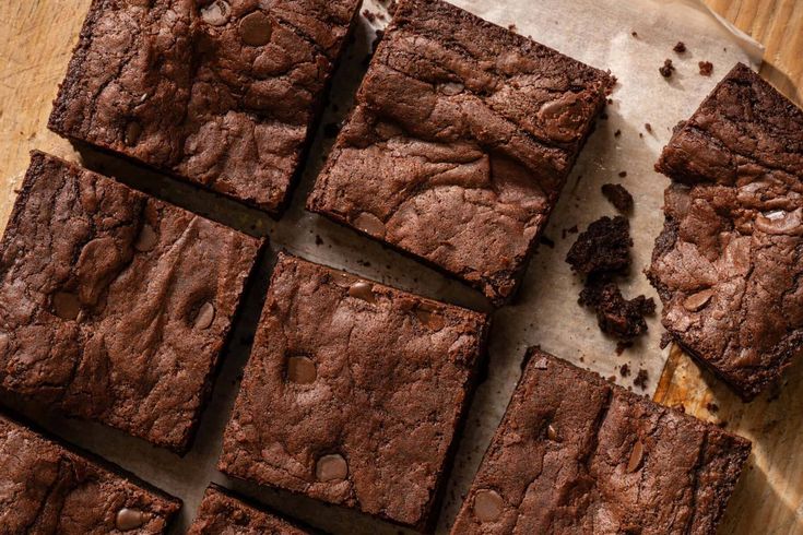 chocolate brownies cut into squares on a cutting board