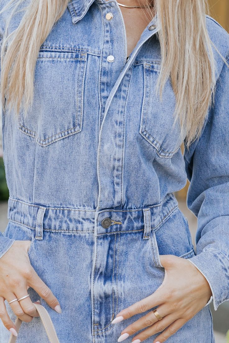 This denim utility dress is the perfect blend of fashion and function! With long sleeves and a collared neckline, it features a button up zip closure and elastic back waistband for a comfortable fit. Complete with chest, side, and back pockets, this dress is 80% cotton, 15% polyester, and 5% viscose for durability and style. Simply pair it with block heels, elevated gold jewelry, and a nude clutch for a trendy chic outfit! Sorority Rush Outfits, Nude Clutch, Trendy Chic Outfits, Utility Dress, Rush Outfits, Gameday Dress, Loungewear Dresses, Casual White Dress, Take Me Out