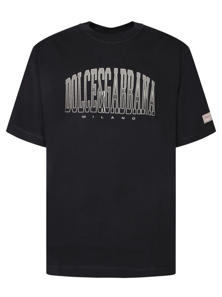 Short sleeves. Silver printed logo. Crew neck.This black Dolce & Gabbana t-shirt embodies urban elegance with a silver embossed logo adding a touch of understated luxury. Perfect for any occasion, from casual to chic.Gender: MenMaterial: 100% COTTONColor: BlackMade in: ImportedProduct ID: G8PN9T G7NWT N0000*Import tax/duty will be calculated at checkout (If applicable) Designer Relaxed Fit Crew Neck Tops, Luxury Monogram Print Crew Neck T-shirt, Luxury Letter Print T-shirt For Streetwear, Luxury Short Sleeve T-shirt With Embroidered Logo, Luxury Designer Logo T-shirt With Short Sleeves, Luxury Short Sleeve T-shirt With Designer Logo, Black Designer Logo Crew Neck Top, Casual Designer Logo Tops For Streetwear, Casual Tops With Designer Logo For Streetwear