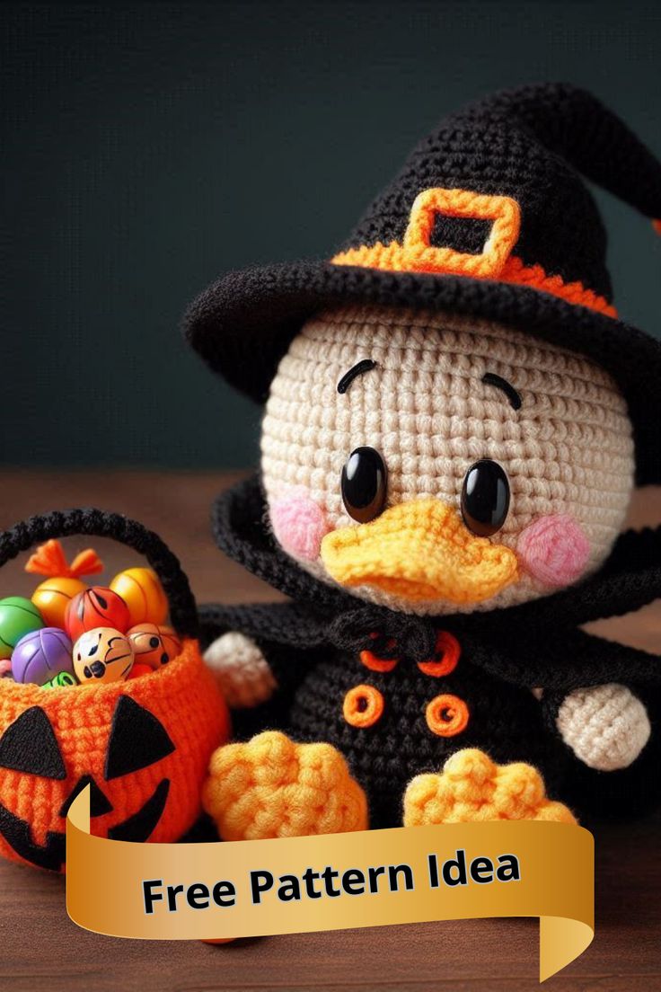 a crocheted penguin with a pumpkin basket