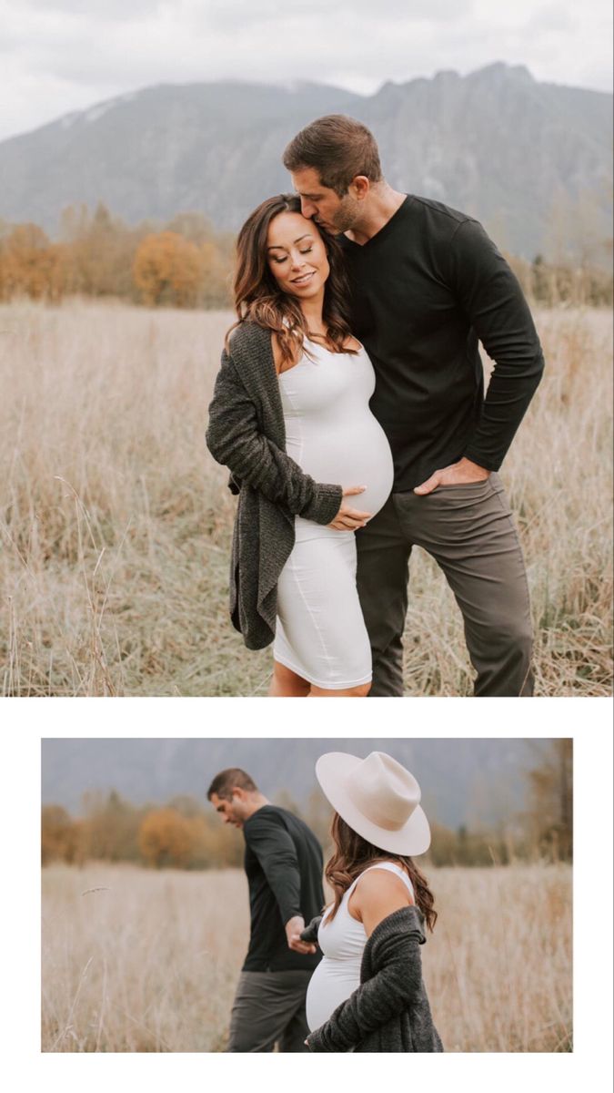 a pregnant couple standing next to each other in a field