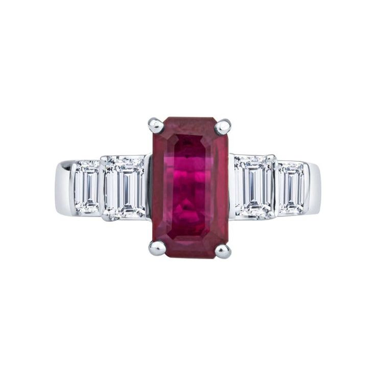 This elegant, sophisticated ring features a 2.40ct, emerald cut, natural Burma ruby (GIA Report #1172411353), with 1.30ct total weight in emerald cut natural diamonds accenting the sides. These stones are set in a platinum ring, which is currently a size 6.75, but may be resized upon request. Antique Promise Rings, Ruby Diamond Engagement Ring, Antique Ruby Ring, Ruby Wedding Ring, Wedding Ring Art, Ruby Ring Vintage, Ruby Wedding Rings, Wedding Rings Art, Promise Ring For Her