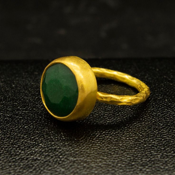 Green Emerald Ring | 24K Gold Plated | Minimalist Jewelry | Statement 925 Sterling Silver Ring | Birthstone Ring | Dainty Ring Our shop offer free ring sizing Handcrafted hammered ring Metal : 925 Sterling Silver Plating : 24K Gold Band Width : 2 mm Gem Stone : Lab Emerald Gem Size : 11 mm Ring Weight : 4.3 grams Ring Size : US 6 (The size you want is made for free). (We used the US standard sizing) **Custom Orders is Made** As pellada family, we will be happy to help you if you contact us with Minimalist Gold Emerald Ring For Everyday, Gold Minimalist Emerald Ring In Sterling Silver, Minimalist Gold Emerald Ring In Sterling Silver, Handmade Minimalist Emerald Ring, Hammered Jewelry, Green Emerald Ring, Emerald Gem, Hammered Ring, Hammered Rings