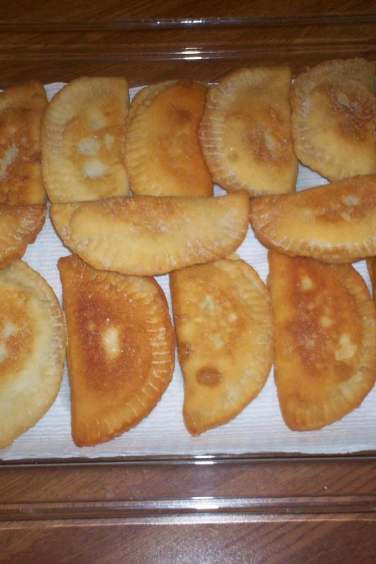 there are many pastries on the tray ready to be eaten