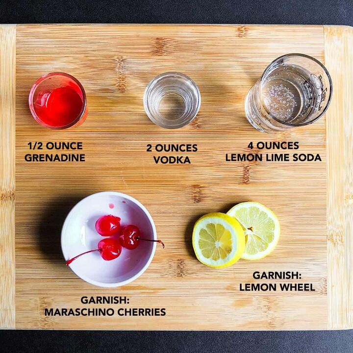 ingredients to make lemonade on a cutting board