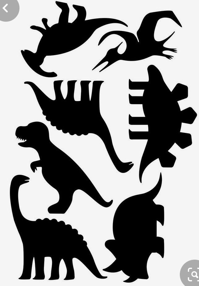 the silhouettes of dinosaurs are shown in black and white