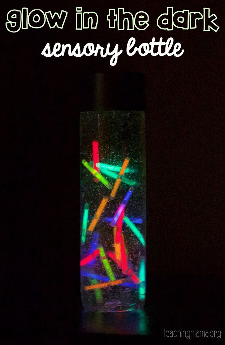 there are neon colored toothbrushes in a tube with the words sensory bottle on it