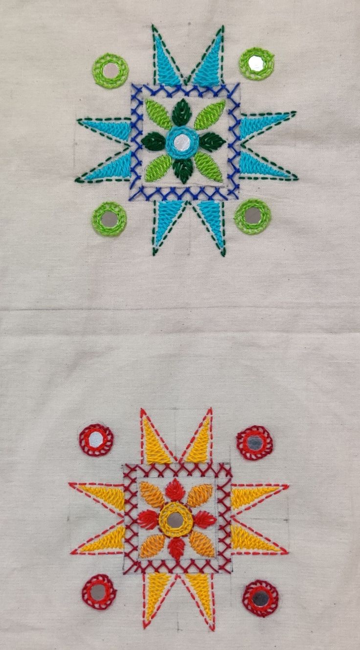 three different types of embroidered designs on white fabric