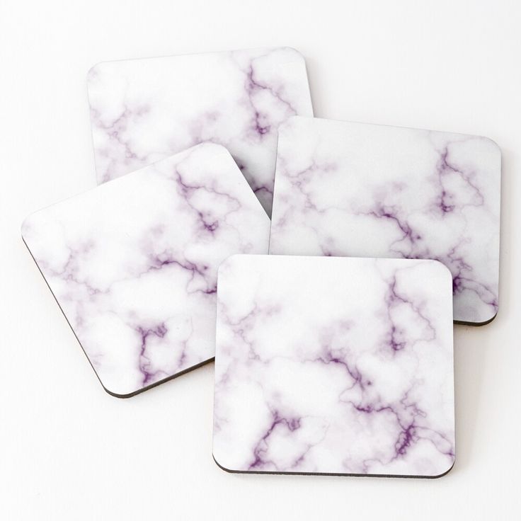 four coasters with white and purple marble design on the top one has a square shape