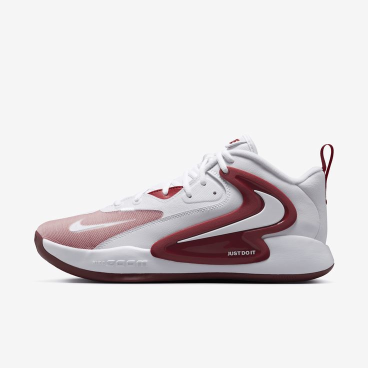 a white and red shoe is shown on a white background with the word nike written in red