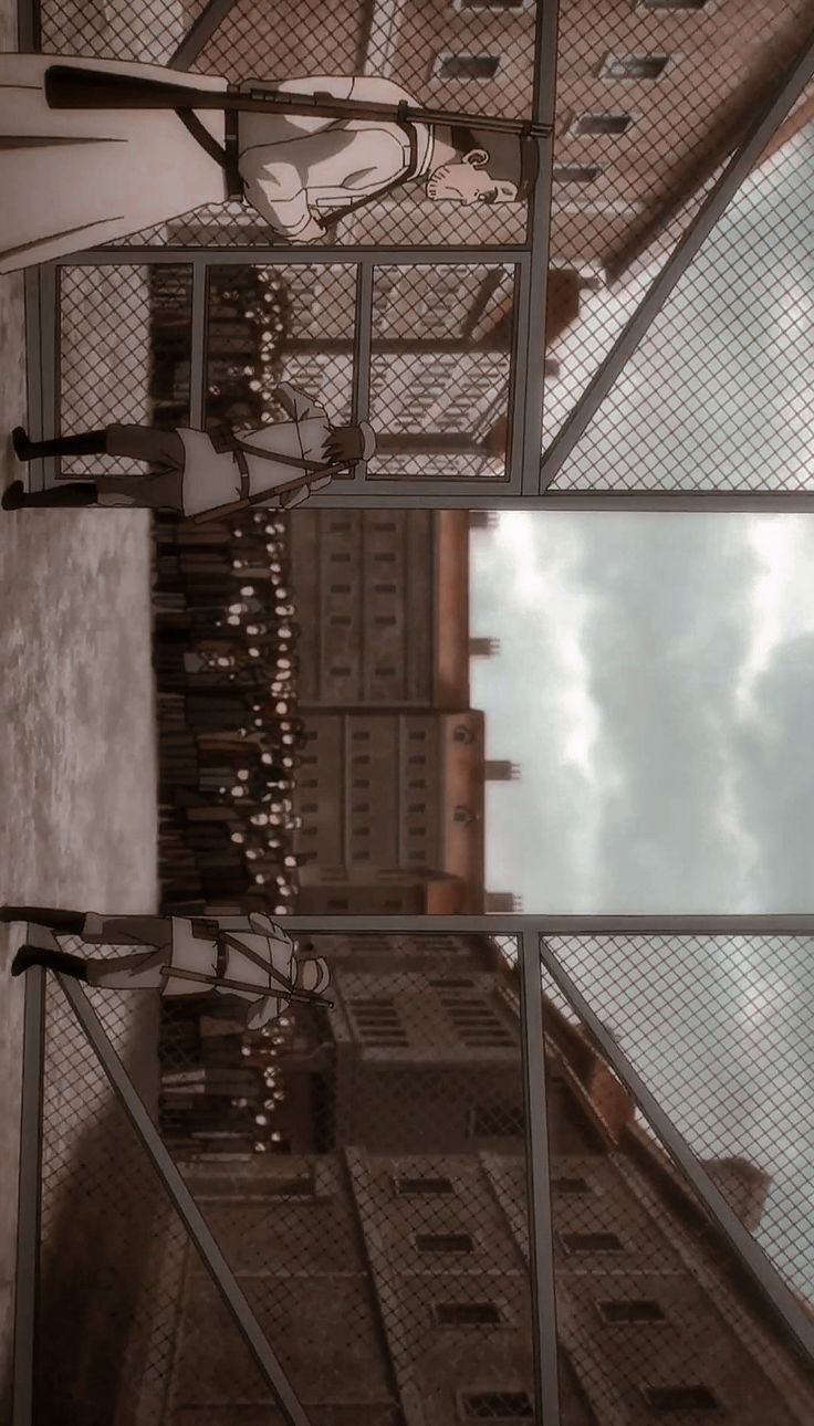 the reflection of a person standing in front of a building's glass door and sky