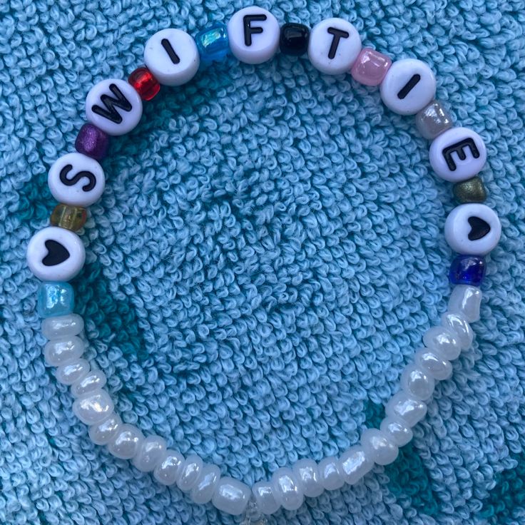 Eras Clay Bead Bracelet, Taylor Swift Eras Clay Bead Bracelet, Bracelet Ideas For Taylor Swift, Taylor Swift Eras Tour Necklace, Taylor Swift Inspo Bracelets, Tay Swift Bracelets, Taylor Swift Concert Outfit Ears, Back To December Taylor Swift Bracelet, Eras Tour Bracelet Ideas Pony Beads