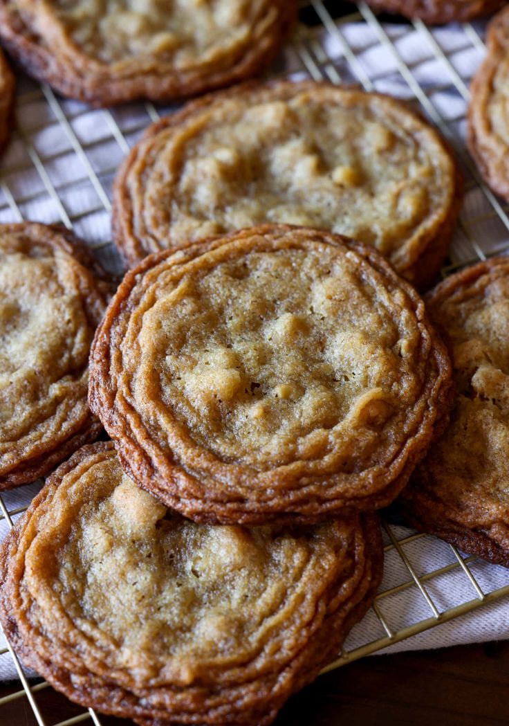 chewy walnut cookies on a cooling rack with the title overlay reading, chewy walnut cookies