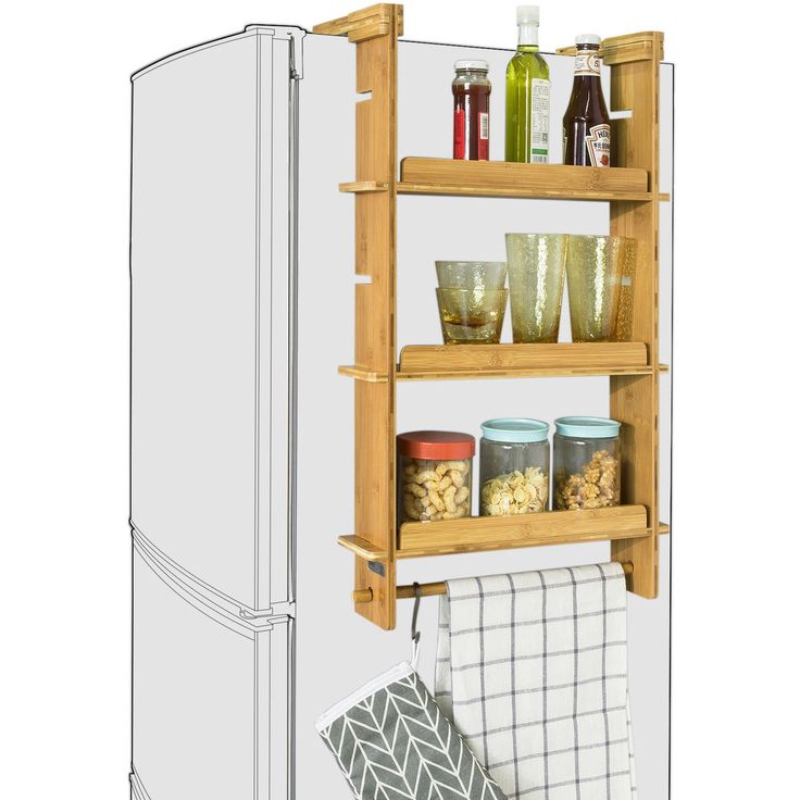 an image of a refrigerator with food on it's shelves and towels hanging from the door