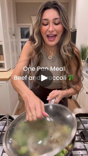 a woman cooking in a pan on top of a stove with the words one pan meal beef and broccoli