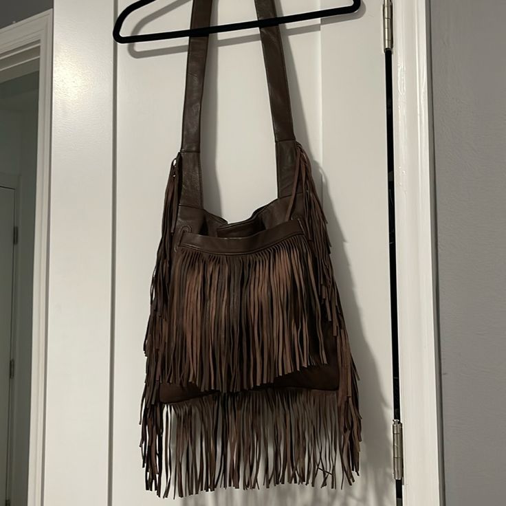 Great Looking ! Zip Inside Comoartment Soft Leather Trendy Brown Hobo Bag With Fringe, Brown Fringe Satchel Bag, Brown Fringe Bag For Daily Use, Brown Fringe Bag For Everyday Use, Bohemian Leather Shoulder Bag For Errands, Brown Fringe Bags For Daily Use, Brown Satchel With Fringe, Daily Use Brown Fringe Bag, Brown Satchel Bag With Fringe