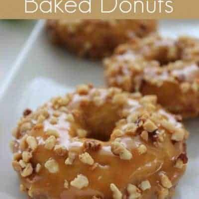 three glazed donuts on a white plate with the words baked donuts above them