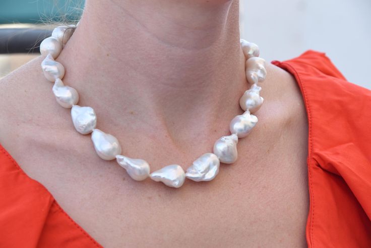 Nothing says timeless like a classic strand of pearls. Our gorgeous necklace features 9mm white freshwater pearls with a gold closure. Whether you’re out for date night, going to a black tie event, or just running errands around town, this beautiful pearl necklace adds a chic and elegant touch to any outfit! Pearl size: 10-11 mmDimension: 36 cm approxCatalog code: 0194 Classic Pearl Necklace With Sterling Silver Clasp For Wedding, Classic Wedding Pearl Necklace With Sterling Silver Clasp, Timeless Pearl Necklace With Sterling Silver Clasp, Formal Baroque Pearl Necklace With Round Beads, Timeless Single Strand Pearl Necklace For Wedding, Timeless Single Strand Necklace For Wedding, Elegant Pearl Necklace With Sterling Silver Clasp For Anniversary, Formal Round Bead Pearl Drop Jewelry, Formal Pearl Drop Jewelry With Round Beads