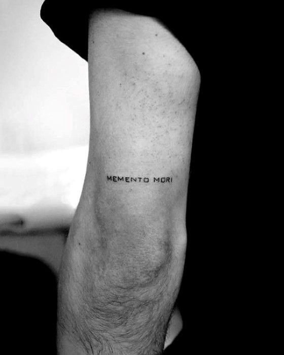 a person with a small tattoo on their leg and the words,'i love you to