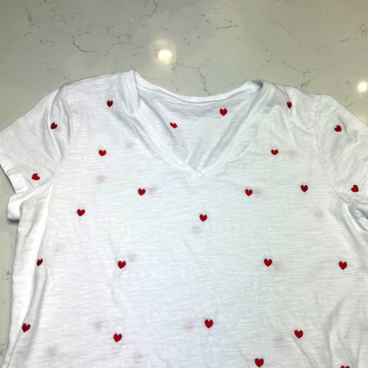 Never Worn 100%Cotton Embroidered Heart Tshirt Size L White Heart-shaped T-shirt For Spring, White Cotton T-shirt With Heart Patch, Casual V-neck Top With Heart Print, White Heart Print T-shirt For Spring, White Relaxed Fit Tops With Heart Print, White Heart Print Top With Relaxed Fit, Red Cotton T-shirt With Heart Print, White Short Sleeve Tops With Heart Print, Casual White Heart-shaped Top