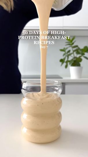 a woman pouring peanut butter on top of a jar with the words 30 days of high protein breakfast recipes